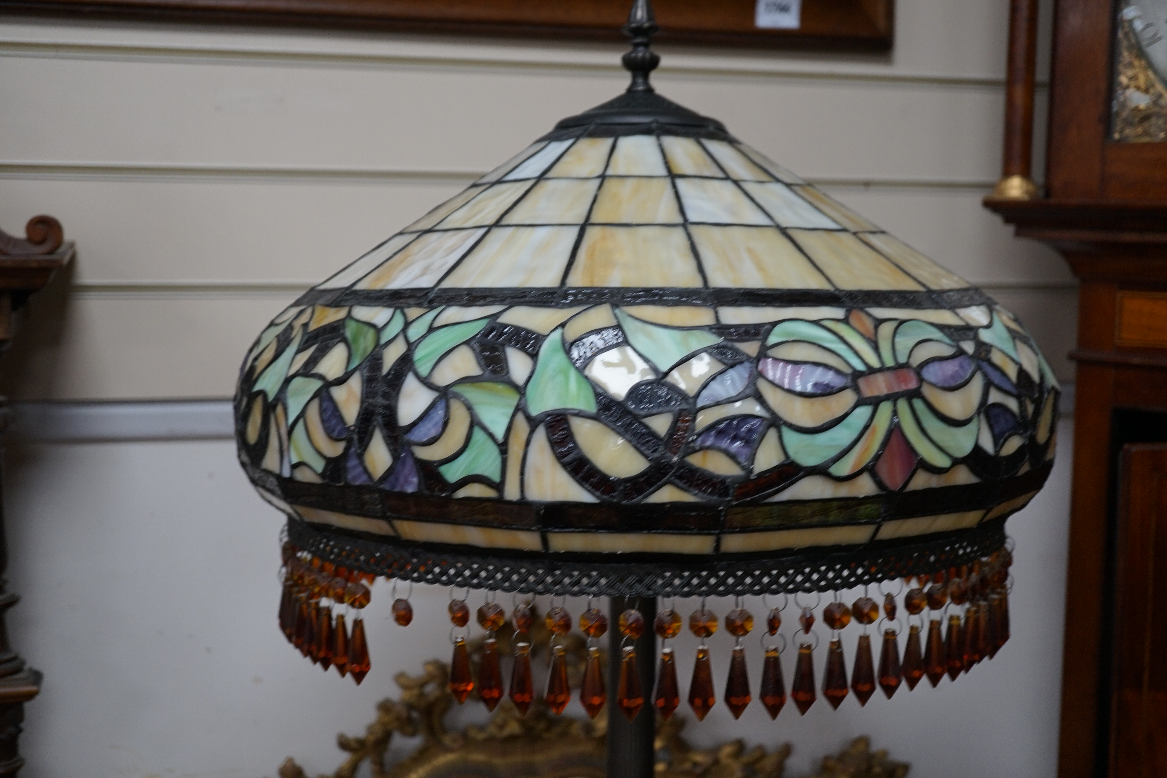 A Tiffany style leaded glass and bronzed metal lamp standard, height 164cm